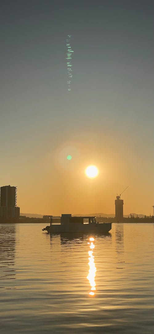 A Boat on Sunset River