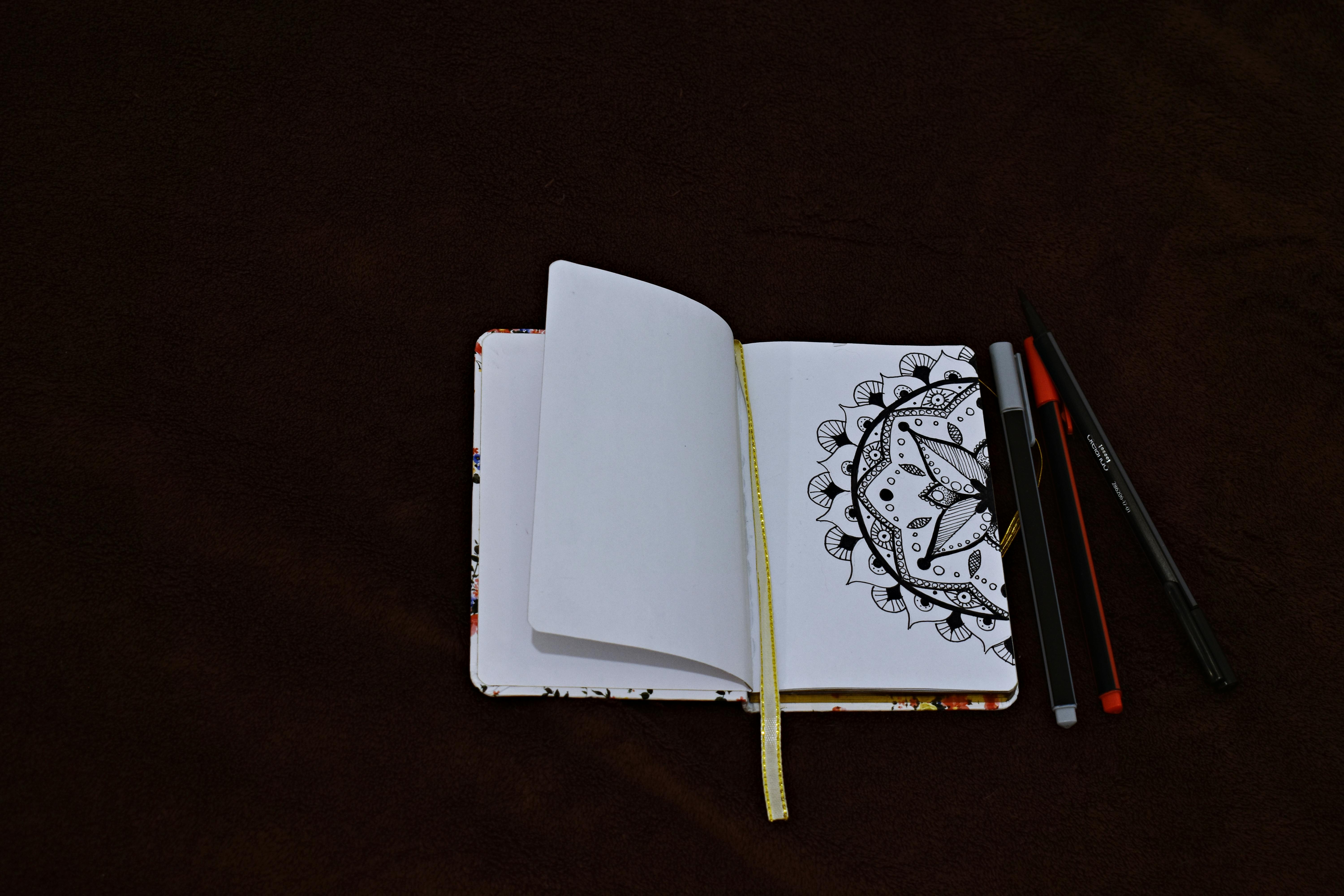 Notebook Beside Pen