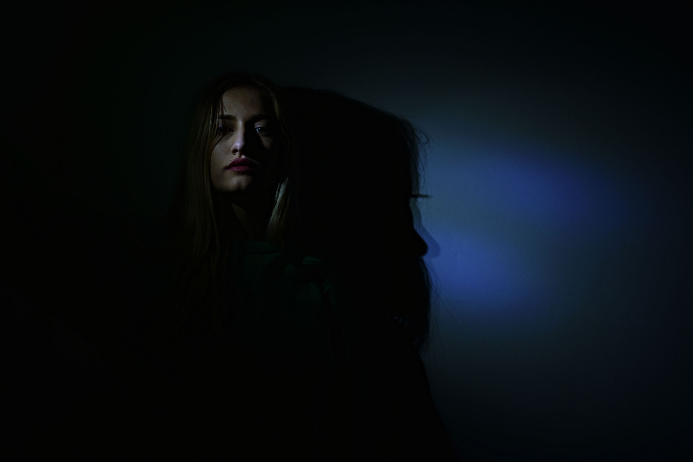 Photo of Woman in Dark Room · Free Stock Photo