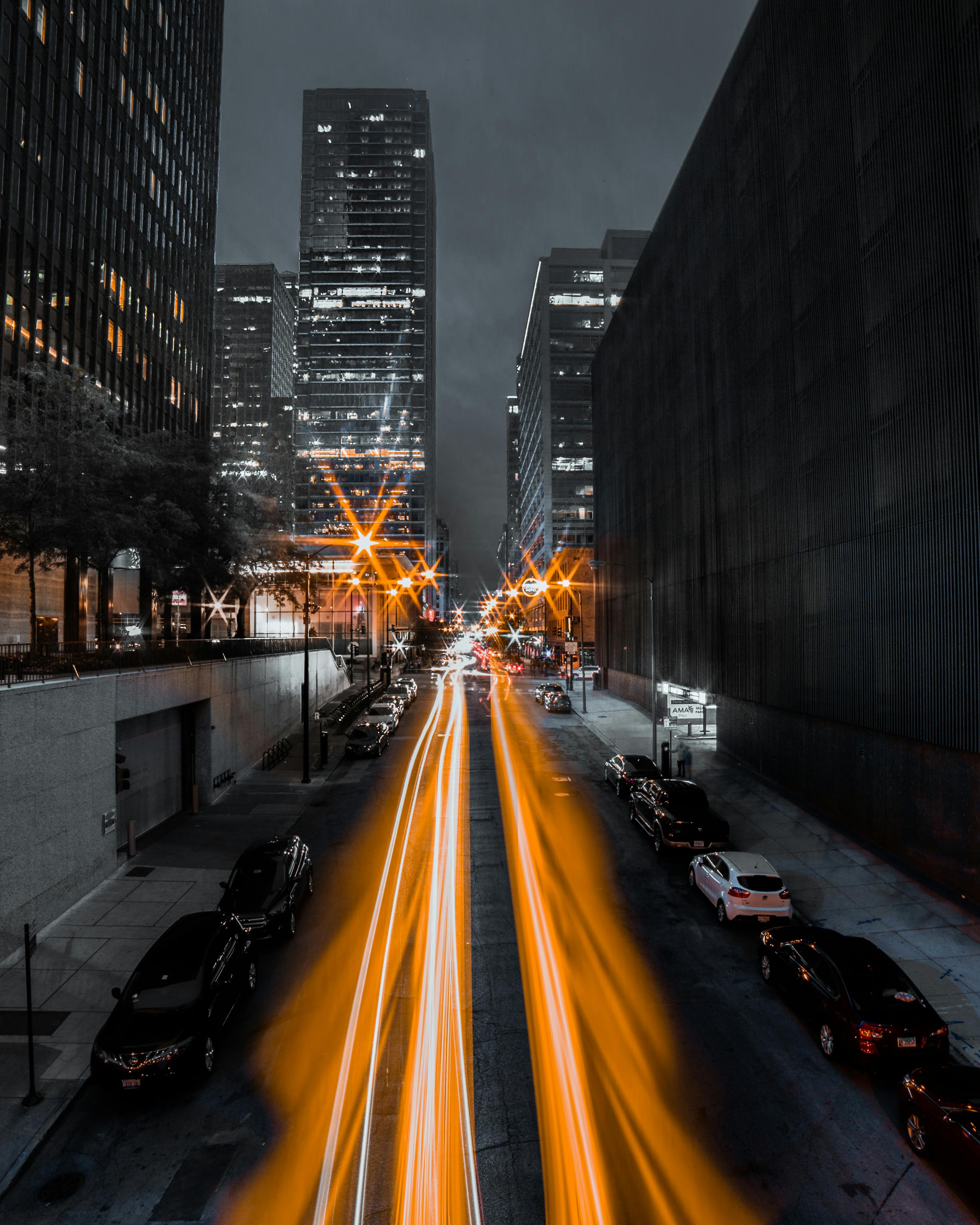 Photo of Light Streaks On Road During Evening