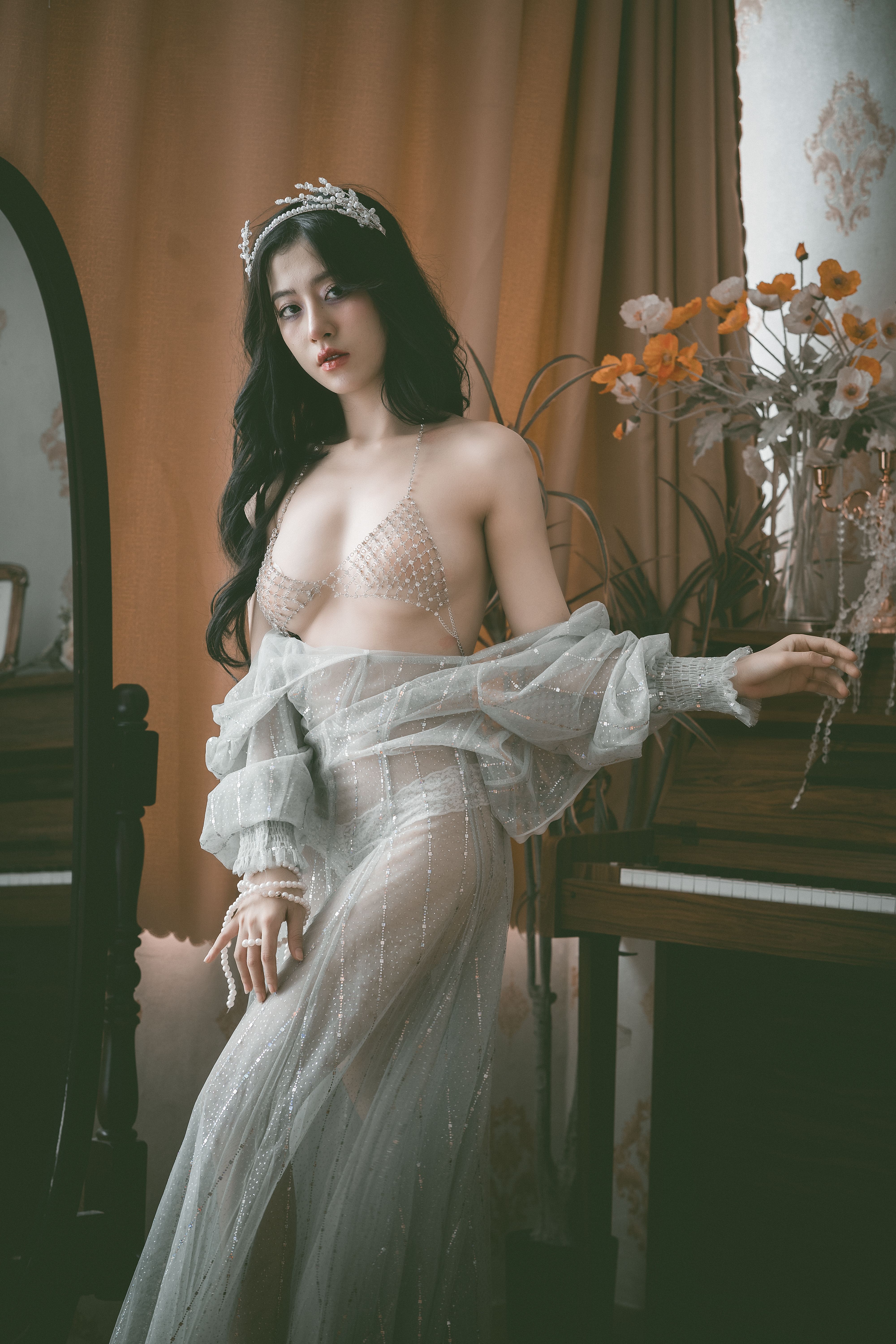 Woman in See-through Dress Standing by Piano  Free Stock Photo