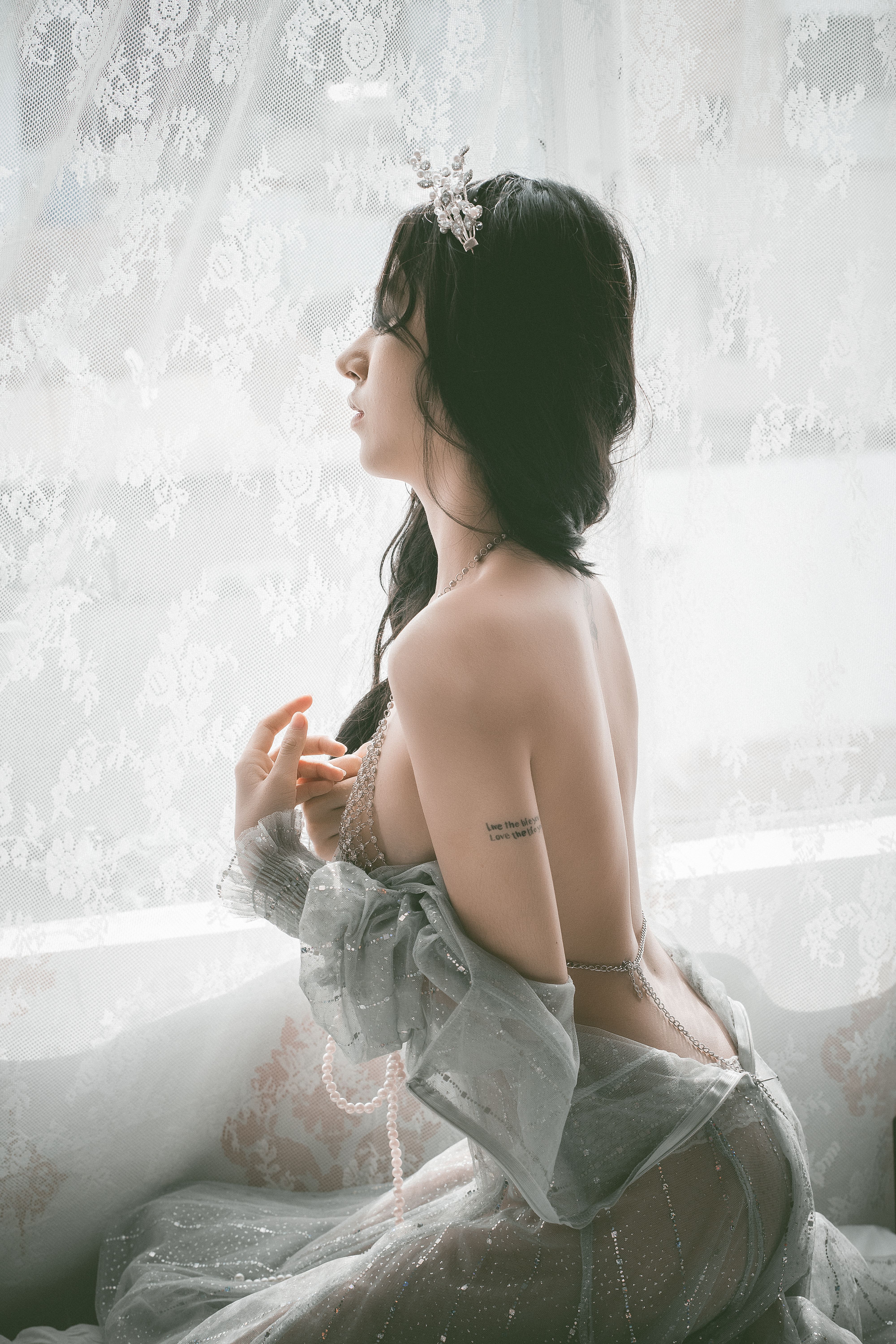 Woman in See-through Dress Looking through Window  Free Stock Photo
