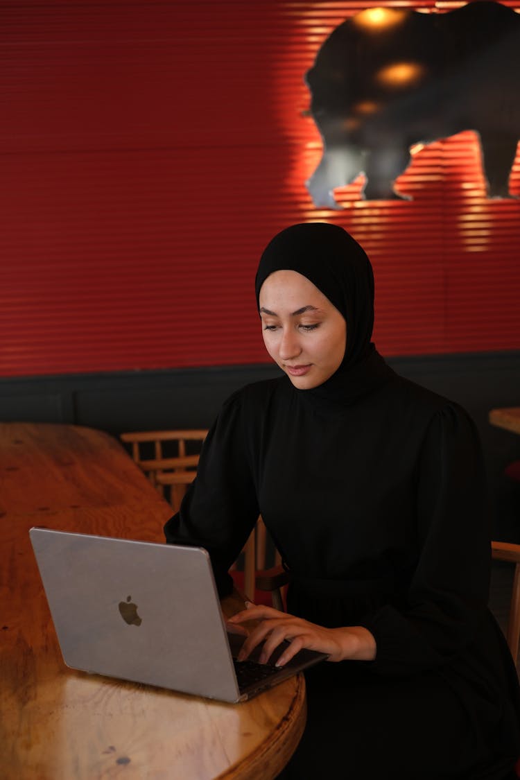 Woman Working On Laptop