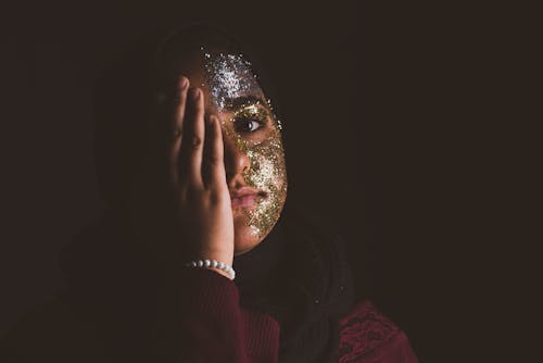 Woman Covering Her Right Eye