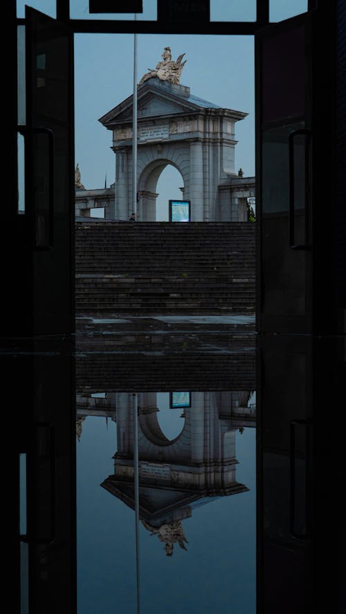 Reflection of an Arch in a Puddle 