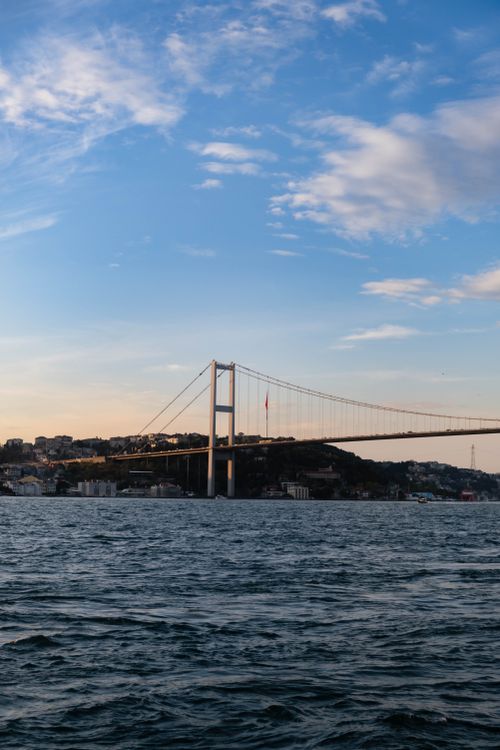 Free Scenic view of the iconic Bosphorus Bridge in Istanbul during day with clear skies. Stock Photo
