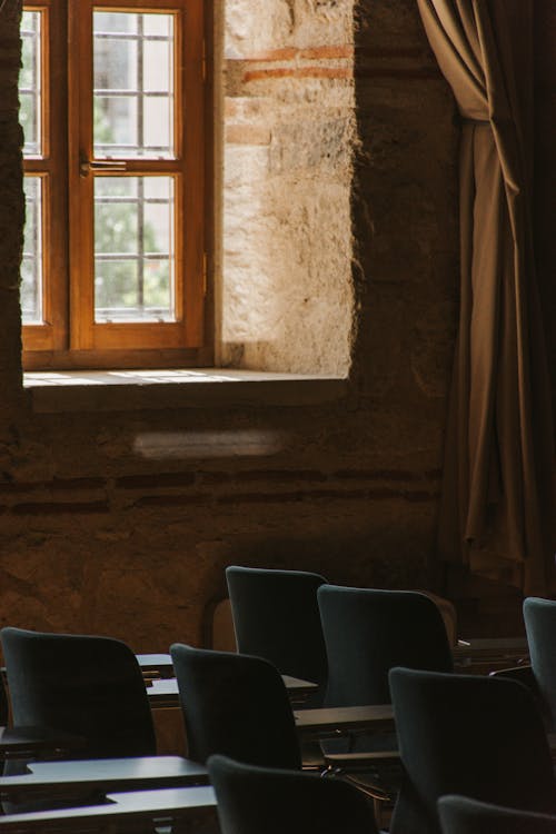 Row of Seats in an Antique Building 