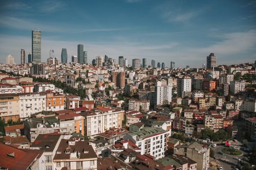Free Discover the bustling cityscape of Istanbul with modern skyscrapers and traditional buildings. Stock Photo