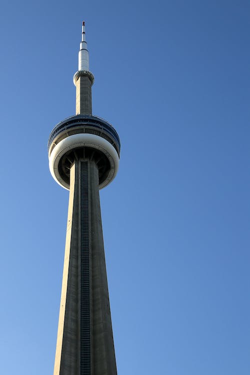 Low Angle Shot of the CN Tower against Clear Blue Sky 
