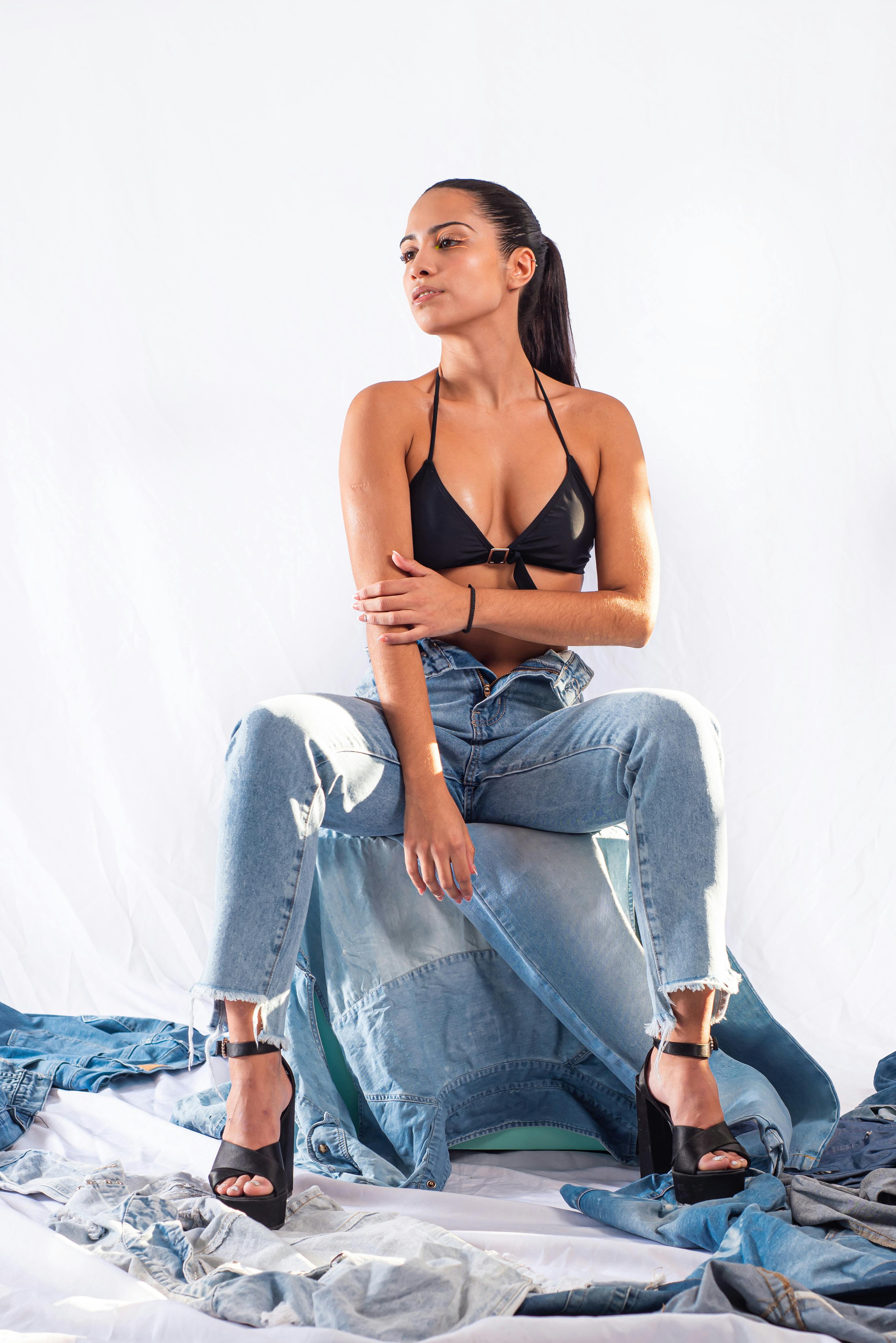 Young Brunette Woman Posing in Light Blue Denim Shirt and Jeans · Free  Stock Photo