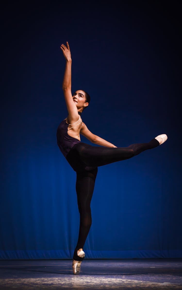 Ballerina Stretching In Pose