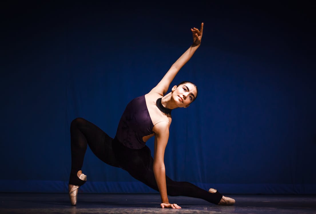 Ballerina Dancing on Dark Background