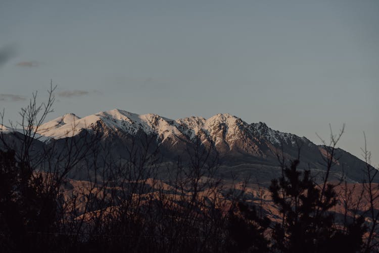 Landscape Of Rocky Snowcapped Mountains 