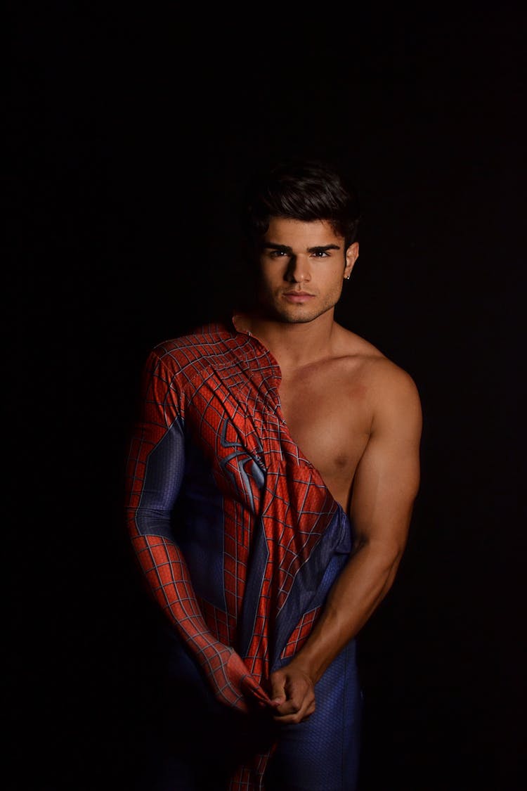 Studio Shot Of A Man In A Spiderman Costume 