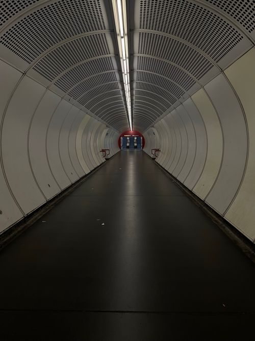 Free Experience the modern architecture of a Vienna underground tunnel with striking symmetry. Stock Photo