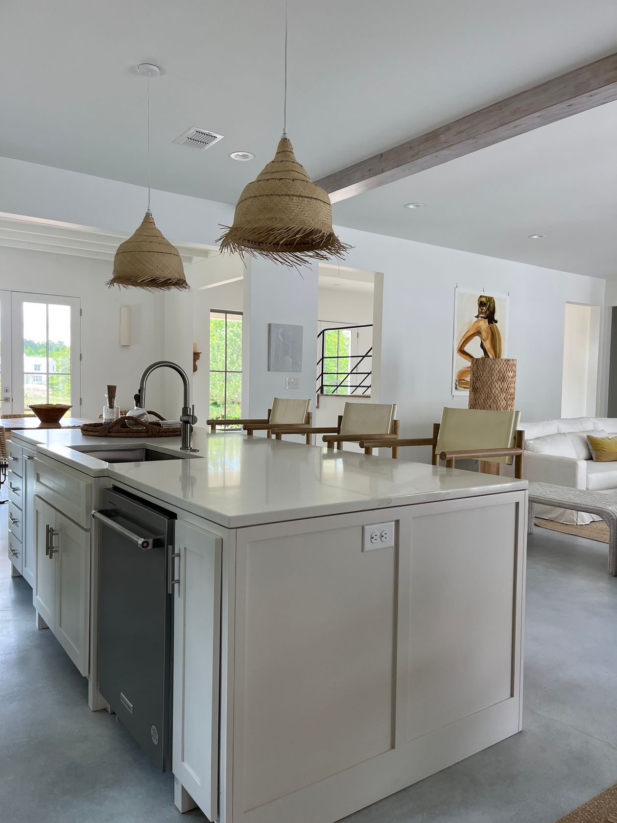 Kitchen with lantern pendants over an island