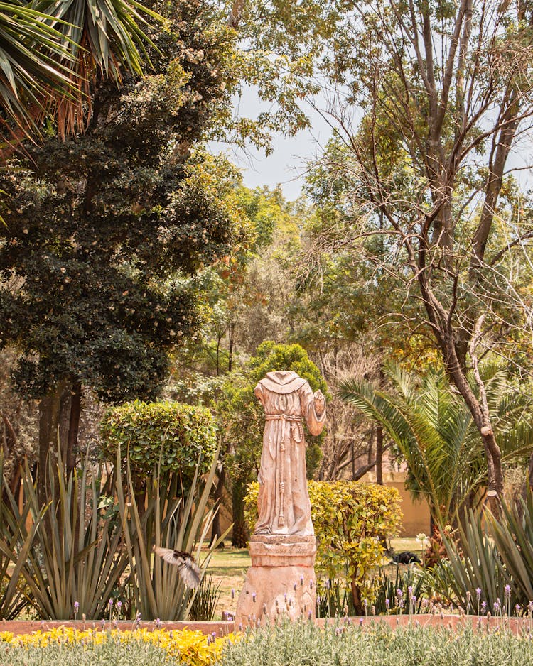 Damaged Sculpture In Garden