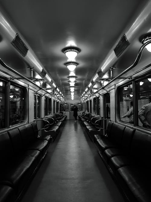 Empty Seats of a Subway Car