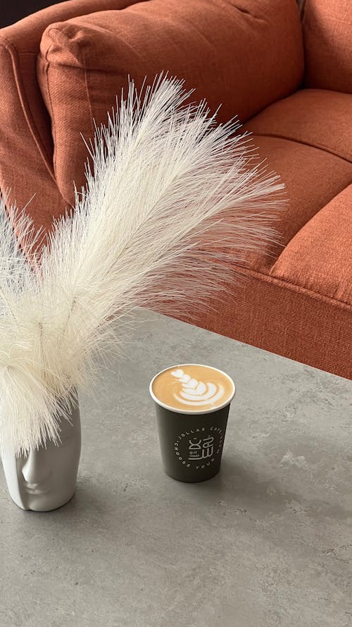 Disposable Cup with Coffee Decorated with Latte Art