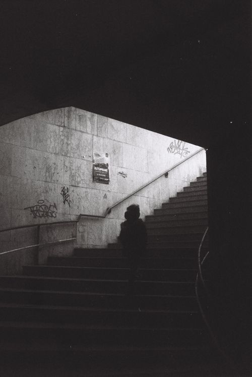 Free Moody silhouette of a person on stairs in Samsun's underground walkway. Stock Photo