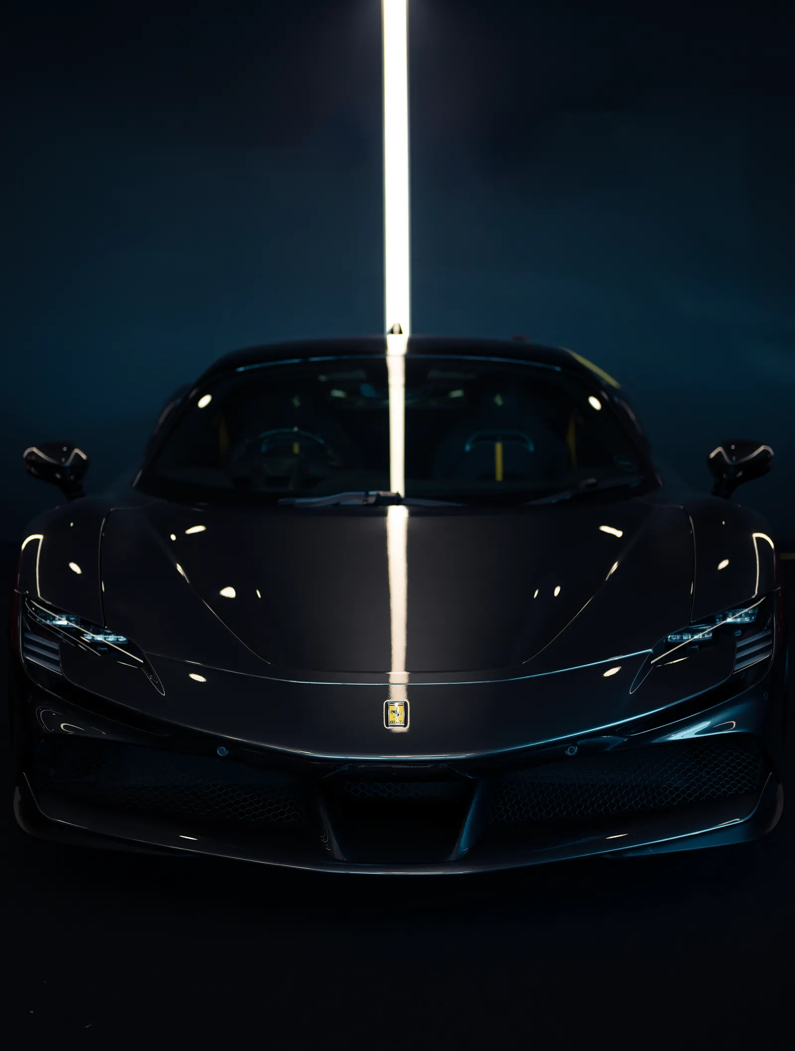 Supercar under studio lighting
