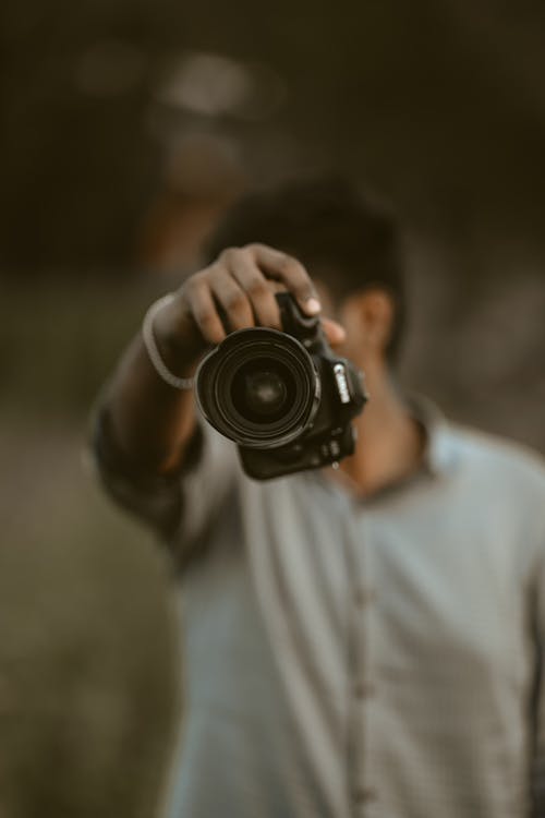 A Man Holding a Camera