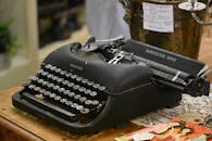 Photo of a Black Vintage Typewriter on a Table