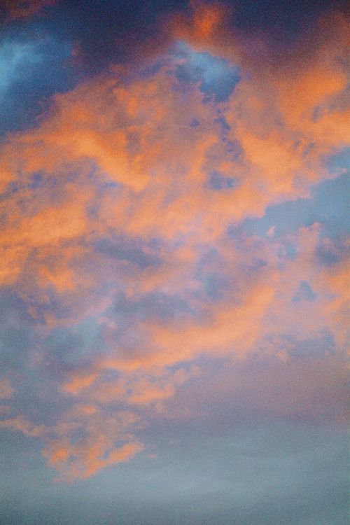 Free Stunning view of pink and orange clouds during sunset over Almaty, Kazakhstan. Stock Photo