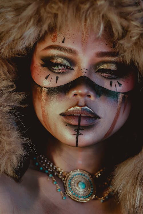 Woman with Creative Makeup in Fur Hat