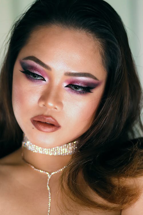 Portrait of a Young Woman in a Glamour Makeup Look 