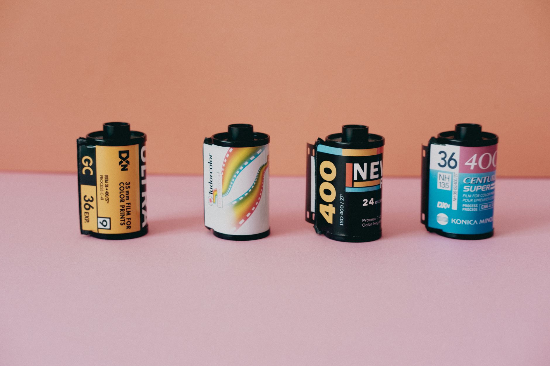 Analog film rolls showcasing classic photography with vibrant backgrounds, perfect for nostalgia enthusiasts.