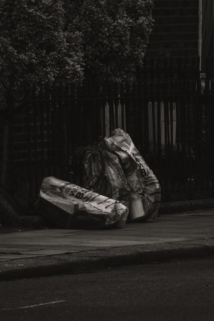 Stock Of Rubbish On Sidewalk