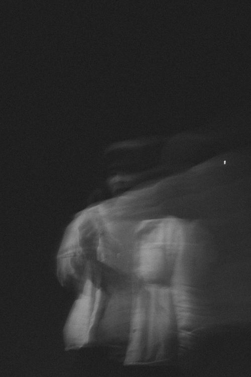 Free Abstract black and white photo of a blurred silhouette with motion effects. Stock Photo