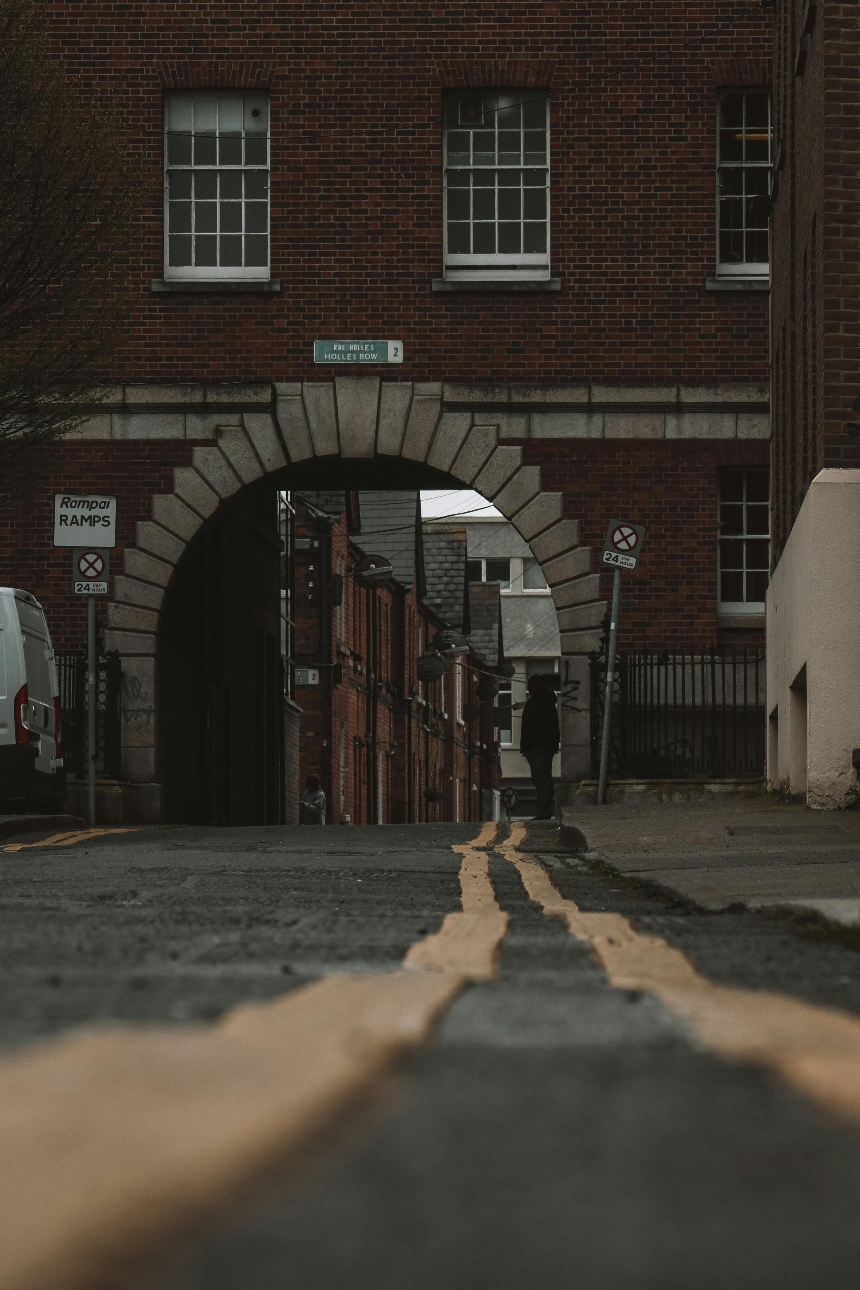 Low Angle Shot of an Archway of Old Brick Building of National