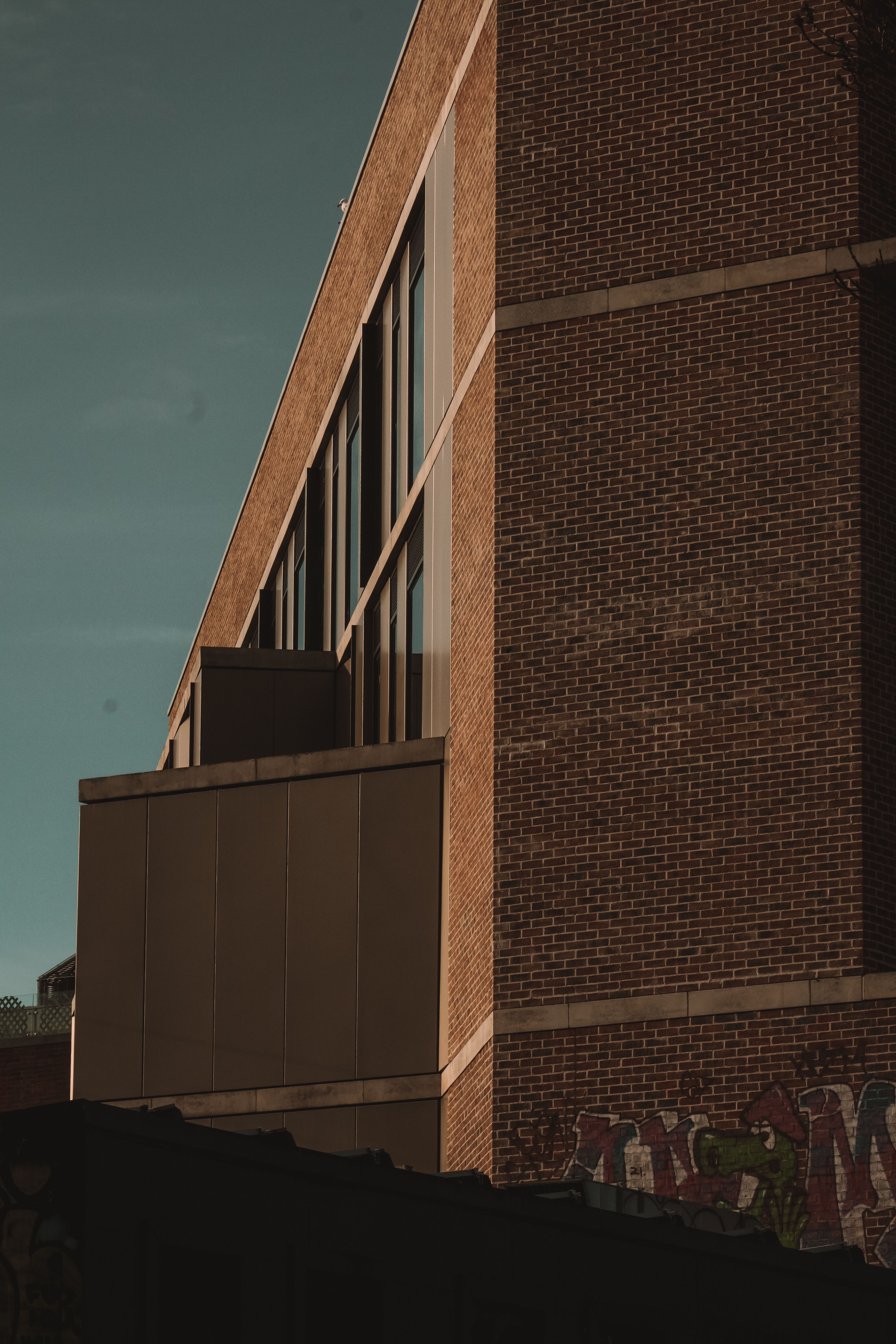 Brick Wall of an Industrial Building · Free Stock Photo