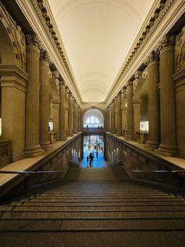 Elegant interior view of the Metropolitan Museum of Art in New York City, showcasing its grand architecture.
