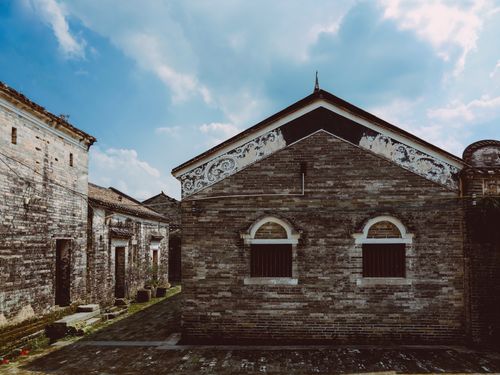 Free Explore gothic brick architecture in an old historical village setting under a bright sky. Stock Photo