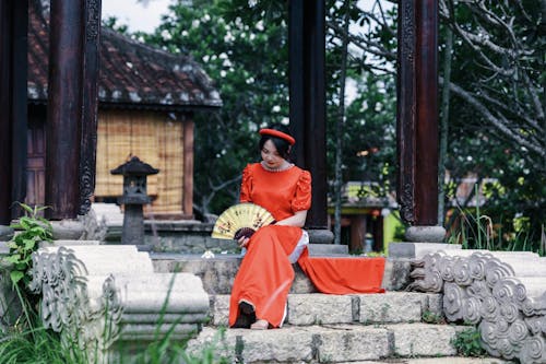 Woman Posing in Traditional, Red Dress