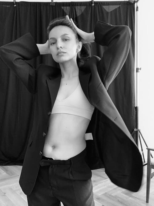 Woman Posing in Blazer in Black and White