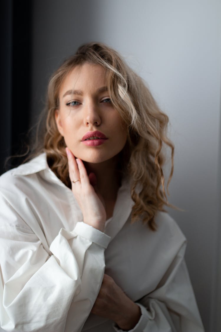 Portrait Of Beautiful Young Woman Posing In Studio