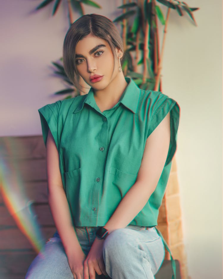 Young Woman In Green Shirt Sleeve Shirt