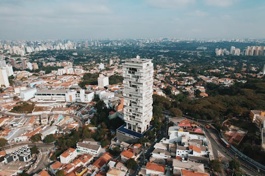 High-angle aerial shot of São Paulo showcasing urban architecture and greenery.