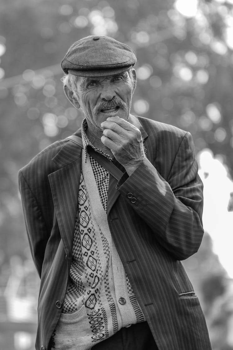 Elderly Man Posing In Suit