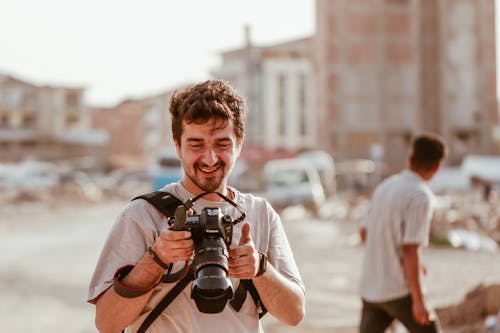 Smiling Photographer in Town