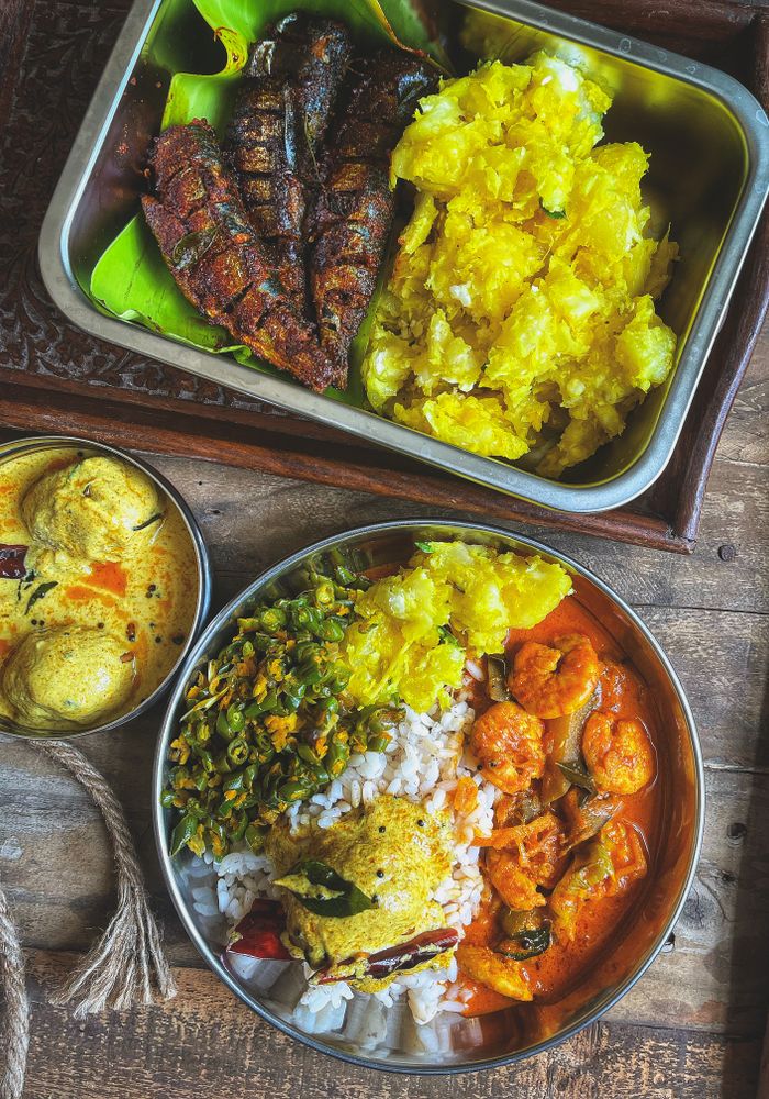 Kerala-style thali with rice, curry and roasted fish
