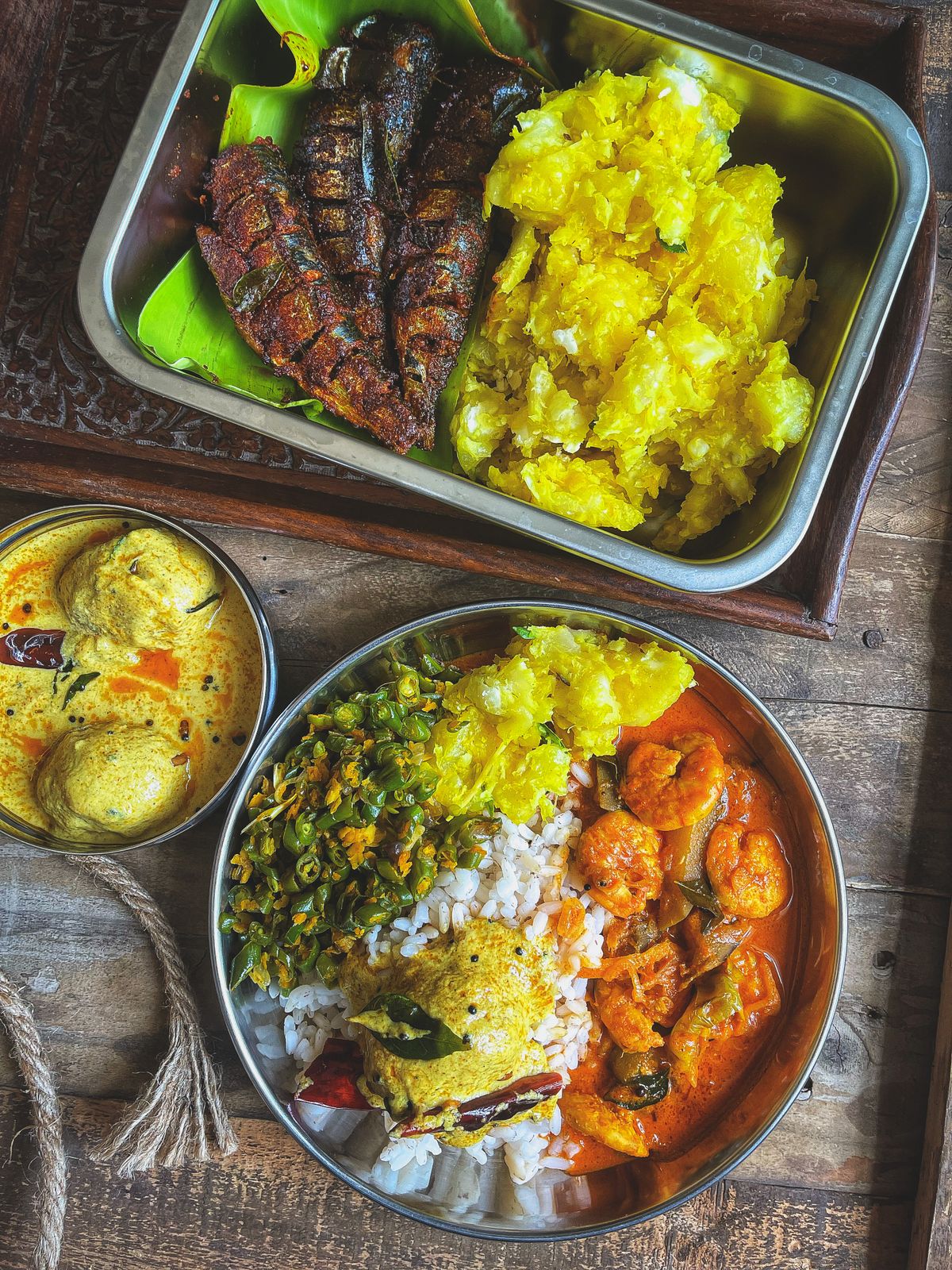 Sri Lankan rice and curry spread on a banana leaf
