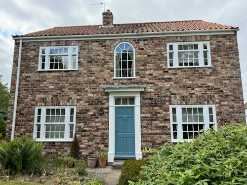 Rustic House with White Windows