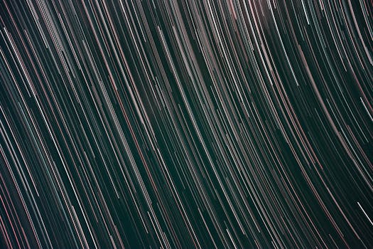 Gorgeous abstract photo capturing the dynamic motion of star trails at night.