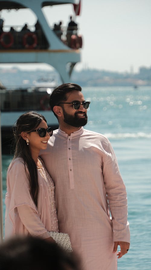 Smiling Couple in Traditional Clothing