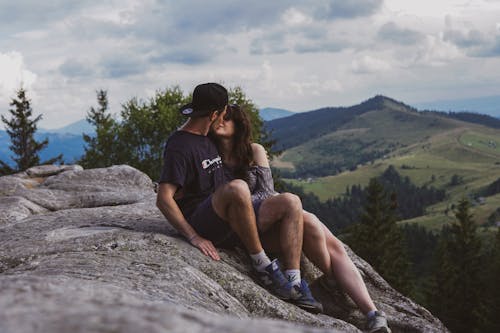 Couple Kissing on a Rock